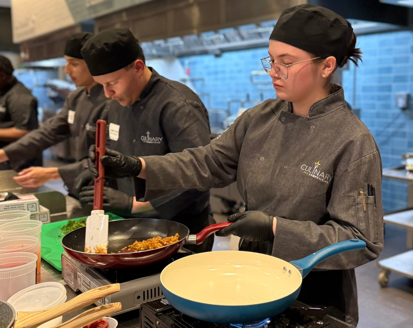 A student participates in the Aramark Student Nutrition Culinary Star competition.